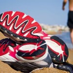 barefoot runner on beach